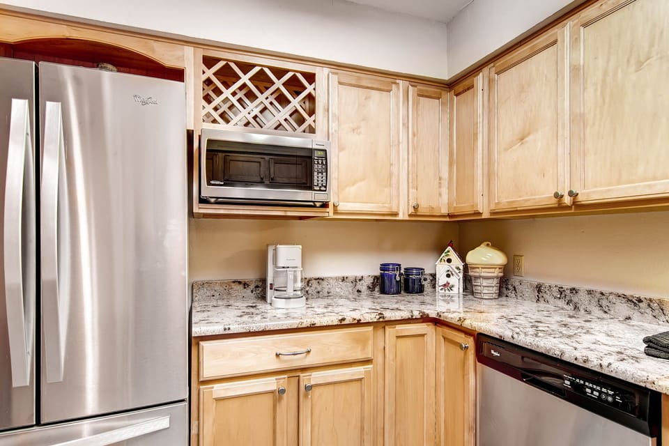 Kitchen with Stainless Steel Appliances and Granite Countertops