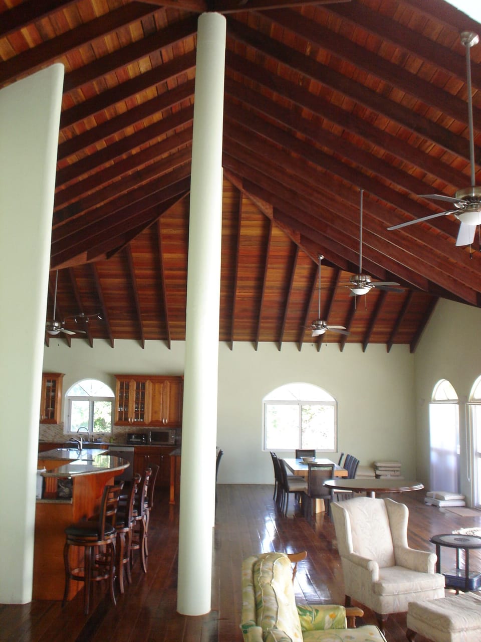 Open concept living room with cathedral ceilings