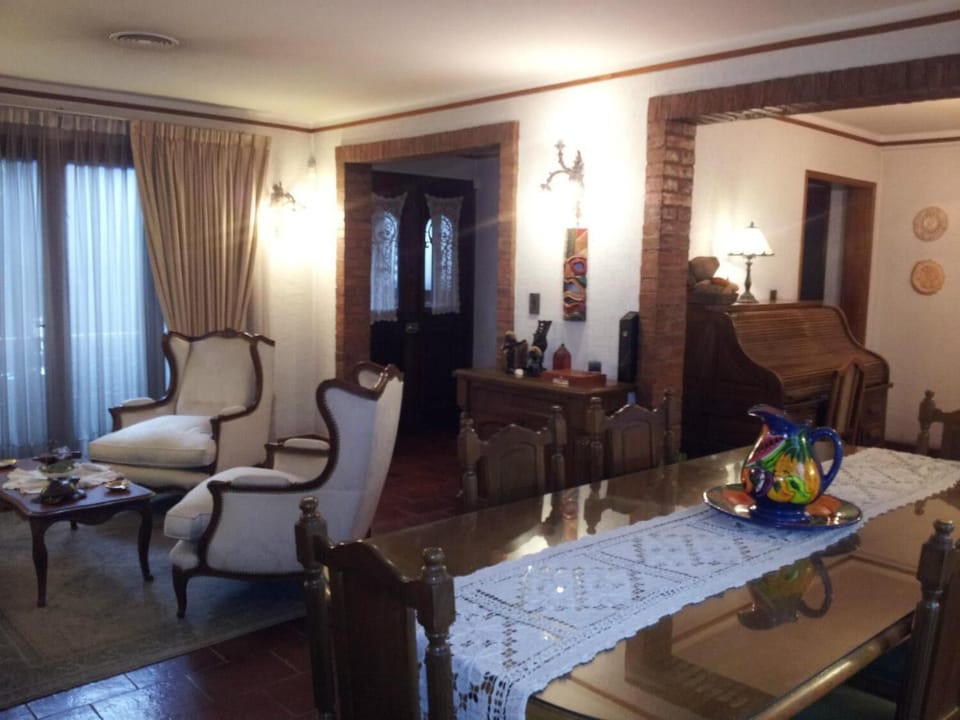 Flat-screen TV, DVD player, iPod dock, pay movies