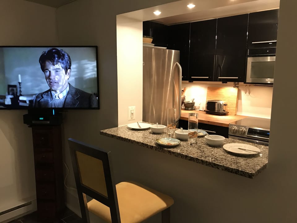 Pass-through from kitchen. Good for serving, conversation and as a bar/buffet. 