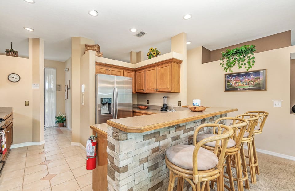 Breakfast bar with four stools.