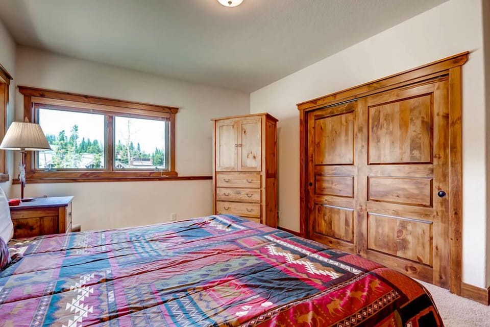 Lots of natural light in bedroom. Flat screen TV inside or Armoire.