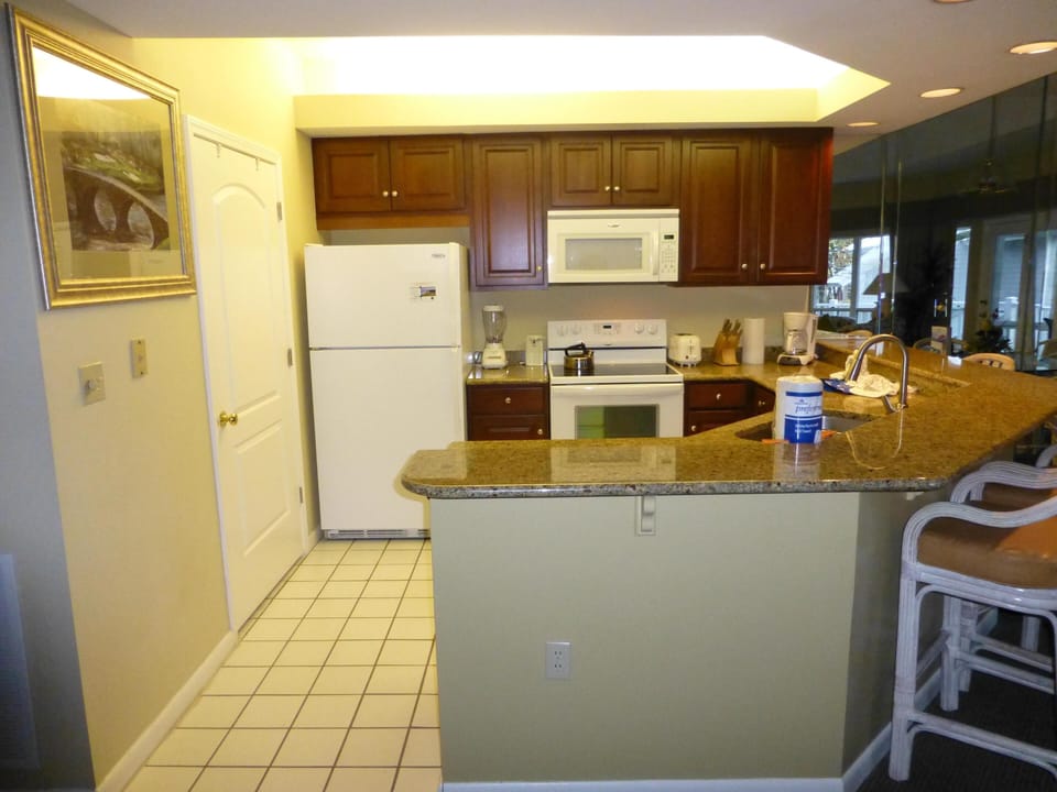 Full sized kitchen equipped with all the essentials including washer and dryer!