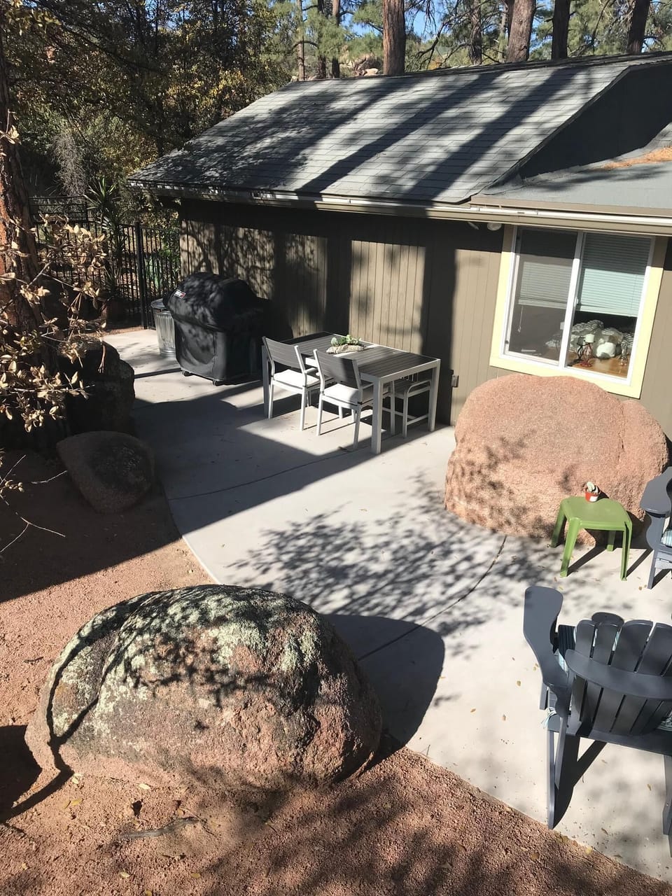 Outdoor table with Weber propane grill. 