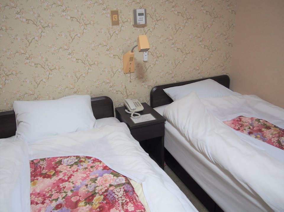 Twin Room with 2 Japanese Size Single Beds, Non Smoking | In-room safe, desk, blackout drapes, iron/ironing board