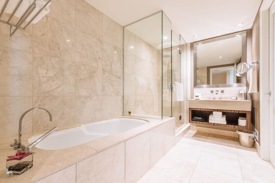 One Bedroom Boutique Suite | Bathroom | Designer toiletries, hair dryer, bathrobes, towels