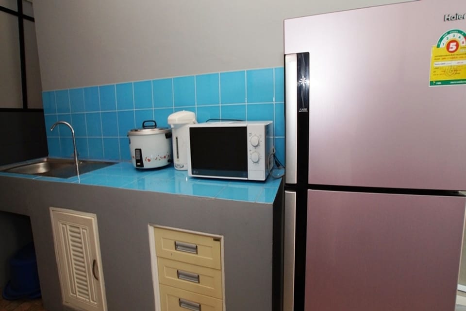 4-Bedroom Private Pool Villa | Private kitchen | Full-size fridge, microwave, stovetop, electric kettle