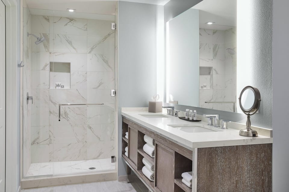 Designer toiletries, hair dryer, bathrobes, towels