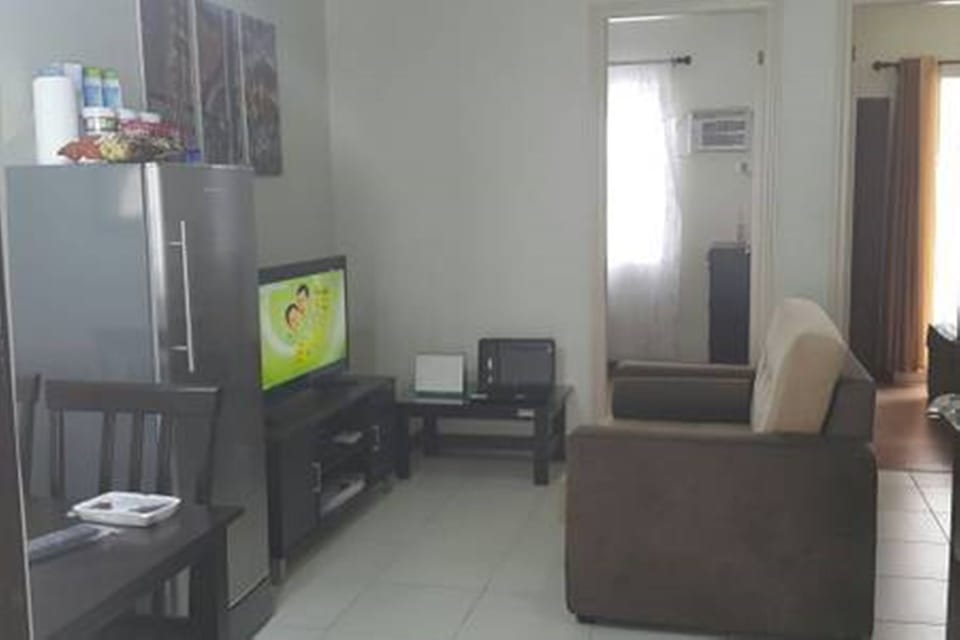 Condo, 2 Bedrooms | Living room | 32-inch LED TV with cable channels, TV