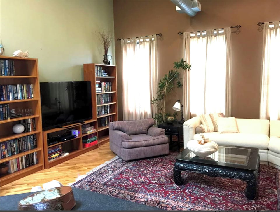 65" TV with Full Cable. 