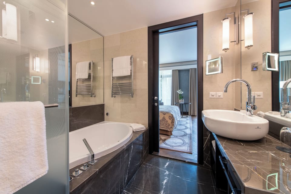 Rainfall showerhead, free toiletries, hair dryer, slippers
