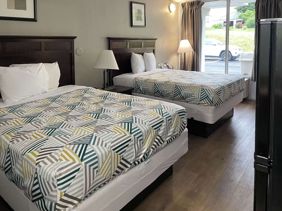 Standard Room, 2 Queen Beds, Non Smoking | Desk, laptop workspace, free WiFi, bed sheets
