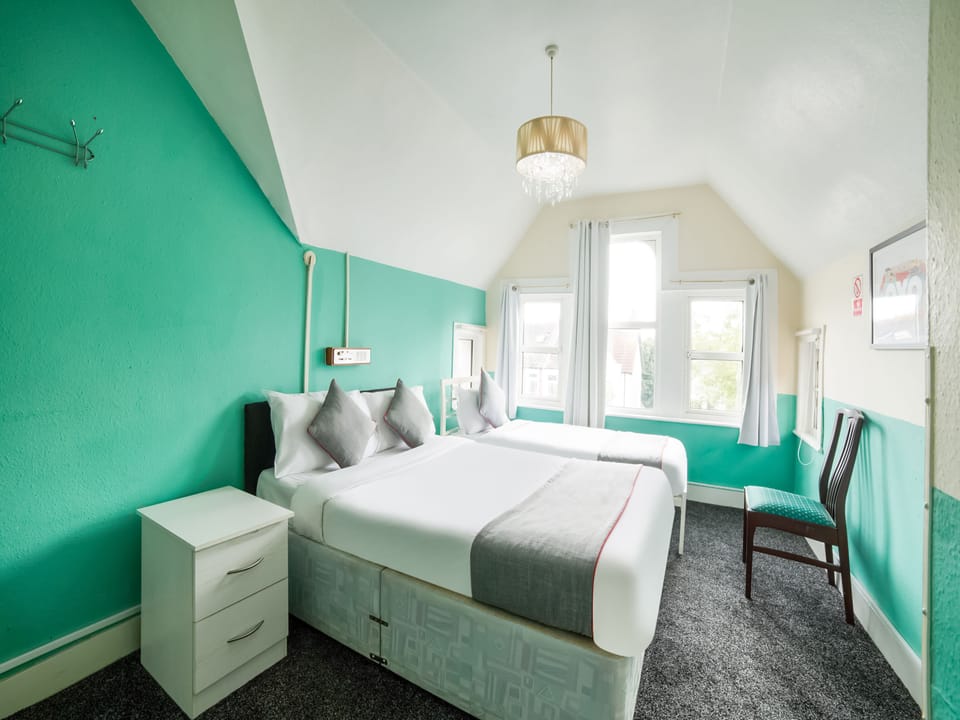 Deluxe Triple Room | Hypo-allergenic bedding, in-room safe, iron/ironing board, free WiFi