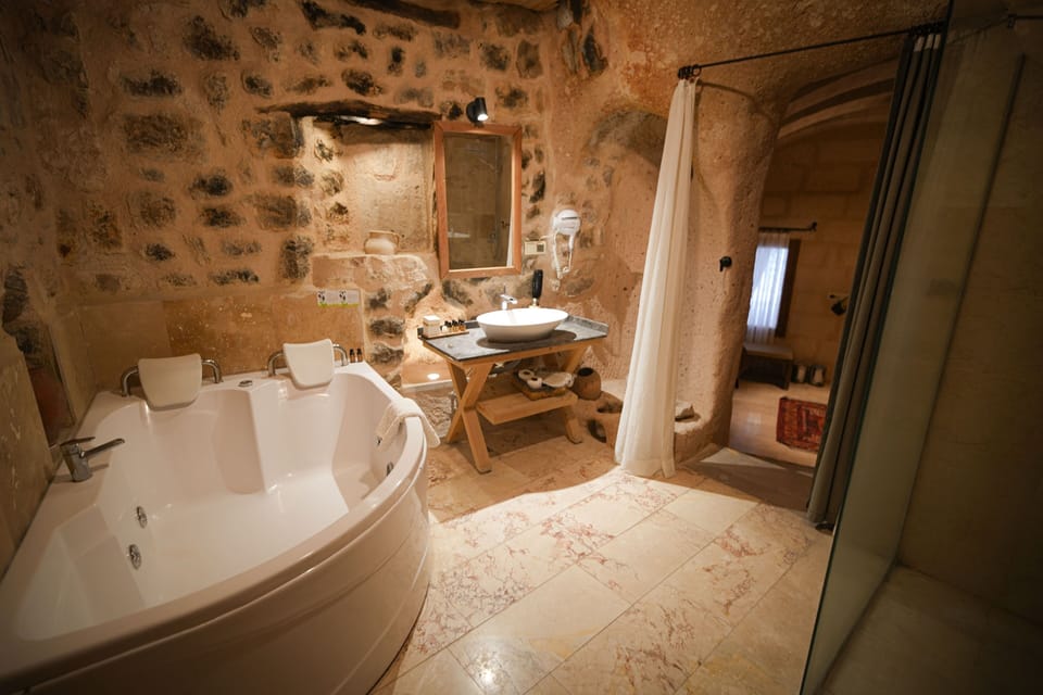 Superior Cave Suites Room | Premium bedding, minibar, individually decorated, individually furnished