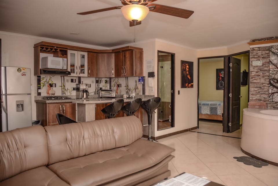 Apartment, 2 Bedrooms, Hot Tub (2 Queen Beds) | Living room | 32-inch flat-screen TV with cable channels, TV