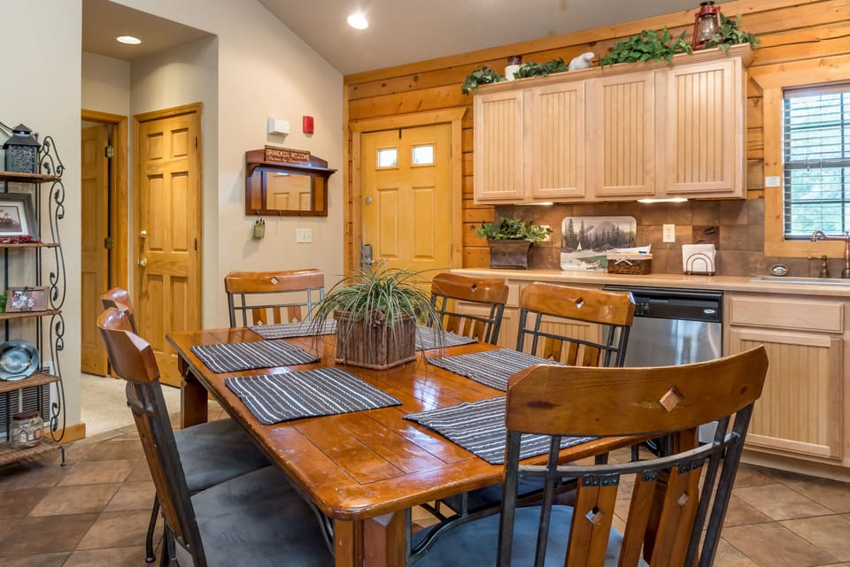 Spacious kitchen with table seating for six.