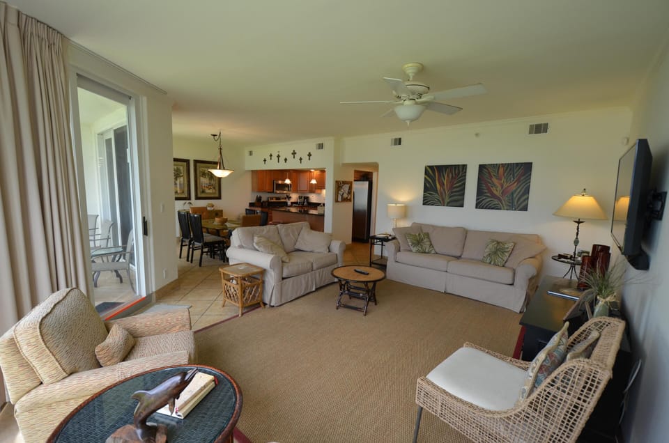 Very large living area with a 55" HDTV.  Beautiful views of the beach!