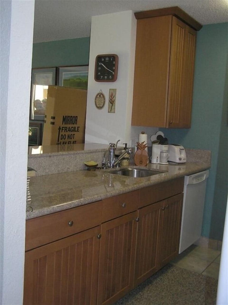 Remodeled kithchen with granite counter-tops and tile floor,filtered water