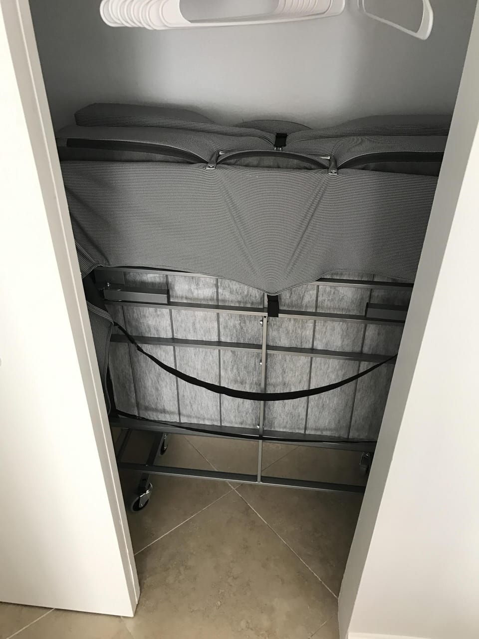 Twin rollaway bed folds and goes in the closet out of the way 