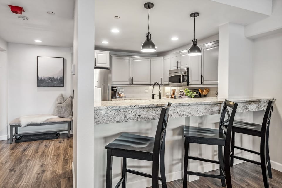 Cozy eat-up bar for 4—perfect for morning coffee or casual family meals.