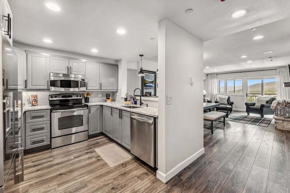Kitchen with stunning town and mountain views—cook, dine, and relax in style.