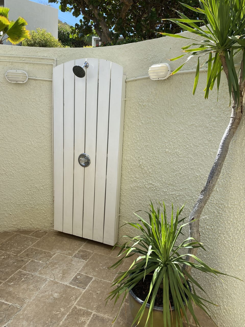 Outdoor shower to spray off the beach sand and bathe under the stars.