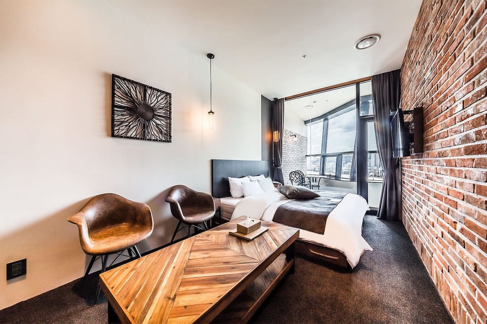 3rd Avenue - Ocean Balcony | Premium bedding, down comforters, memory foam beds, blackout drapes