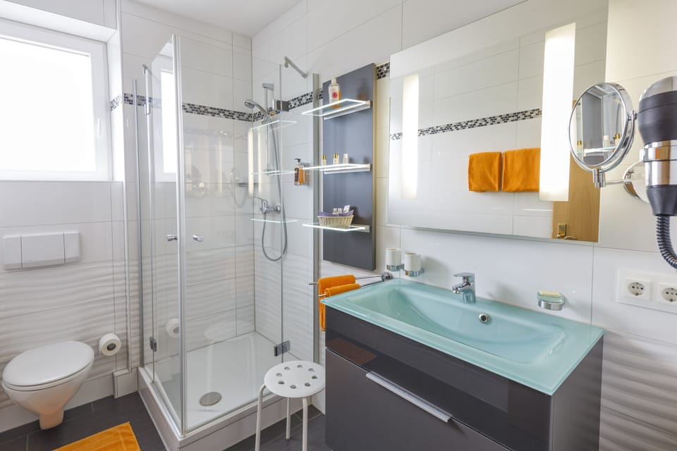 Shower, free toiletries, hair dryer, towels