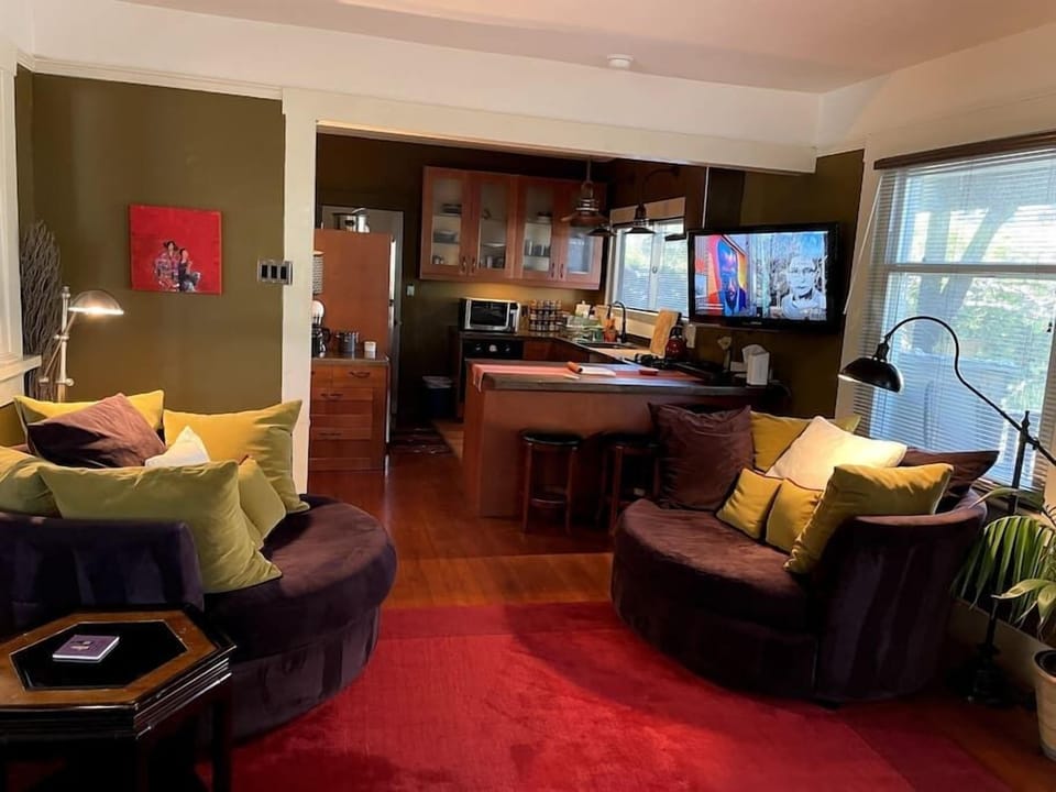 View from trundle bed to living room and kitchen.
