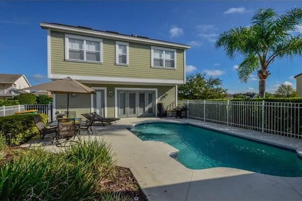 Oversized pool. Child safety gate provided. South facing pool.