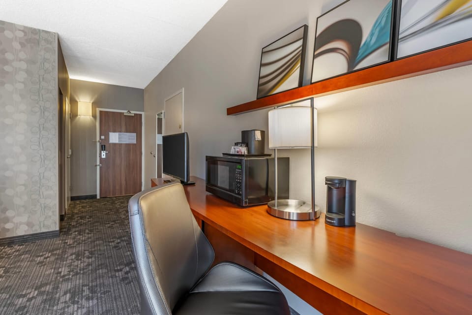 Room, 1 King Bed, Roll-in Shower, Non Smoking | Desk, laptop workspace, blackout drapes, iron/ironing board