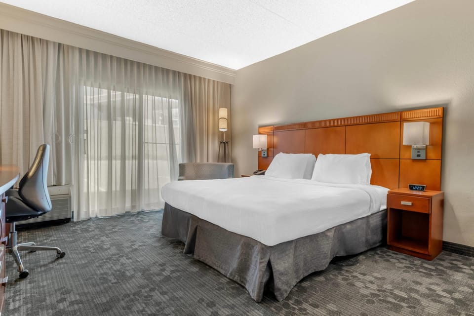 Room, 1 King Bed, Roll-in Shower, Non Smoking | Desk, laptop workspace, blackout drapes, iron/ironing board