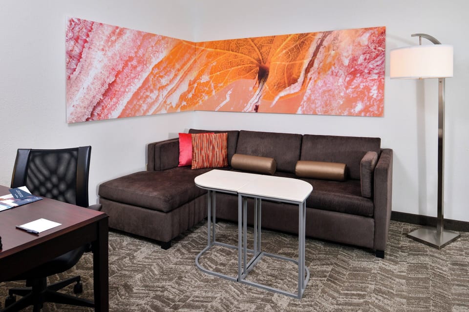 Flat-screen TV, iPod dock, pay movies