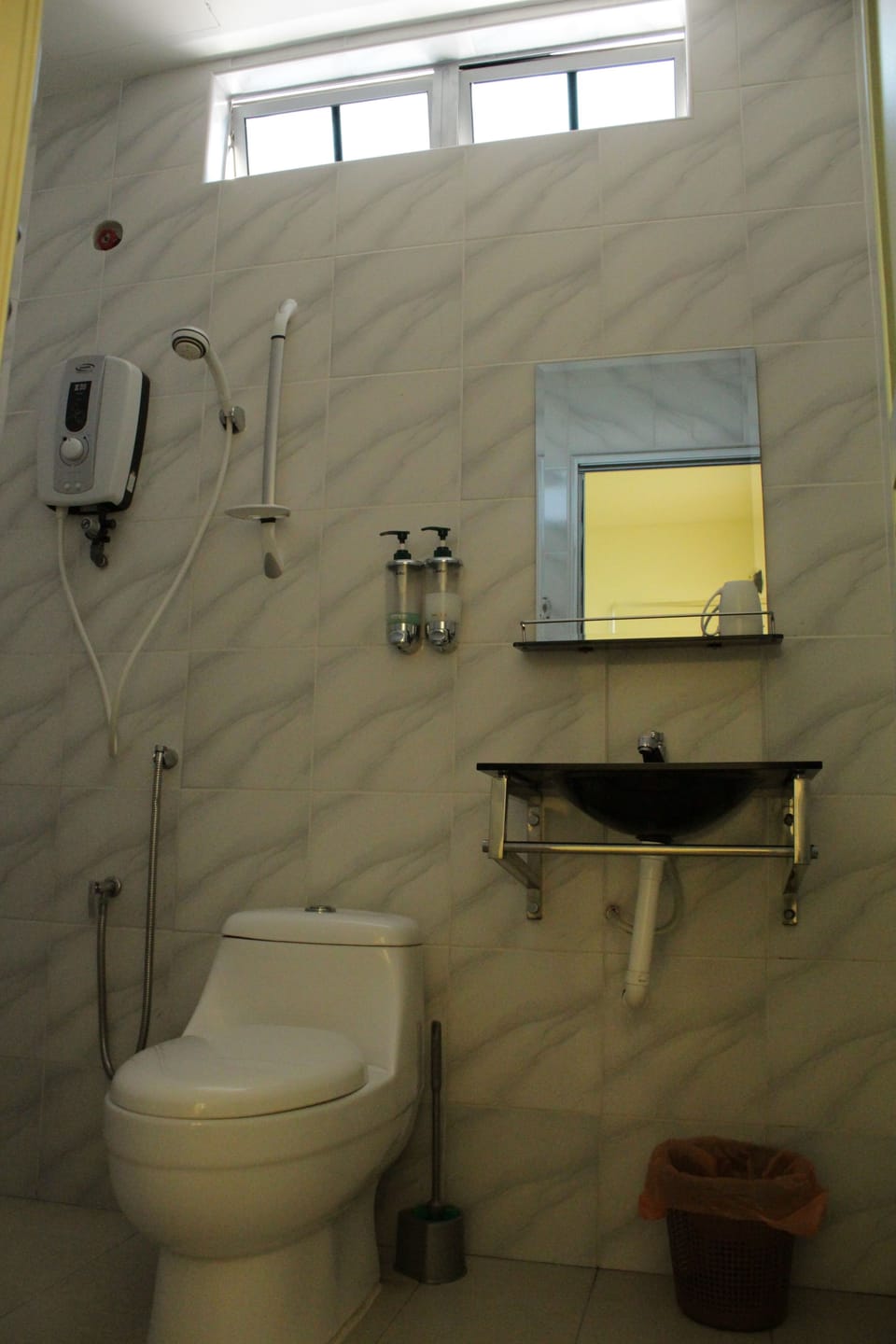 Shower, hair dryer, slippers, towels