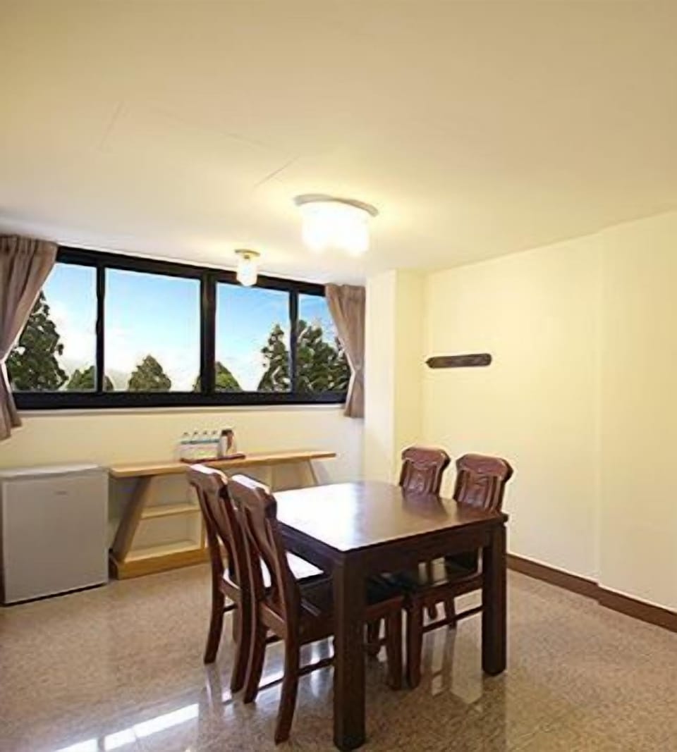 Comfort Quadruple Room, 2 Double Beds, Resort View (M) | Living room | LCD TV