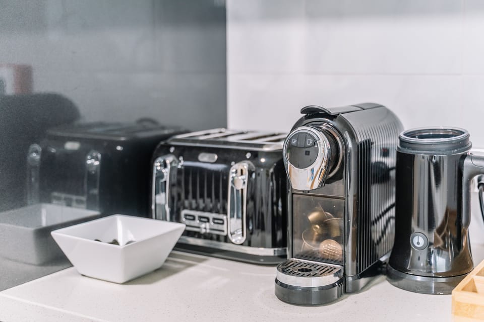 Coffee/tea maker, shared fridge, shared microwave