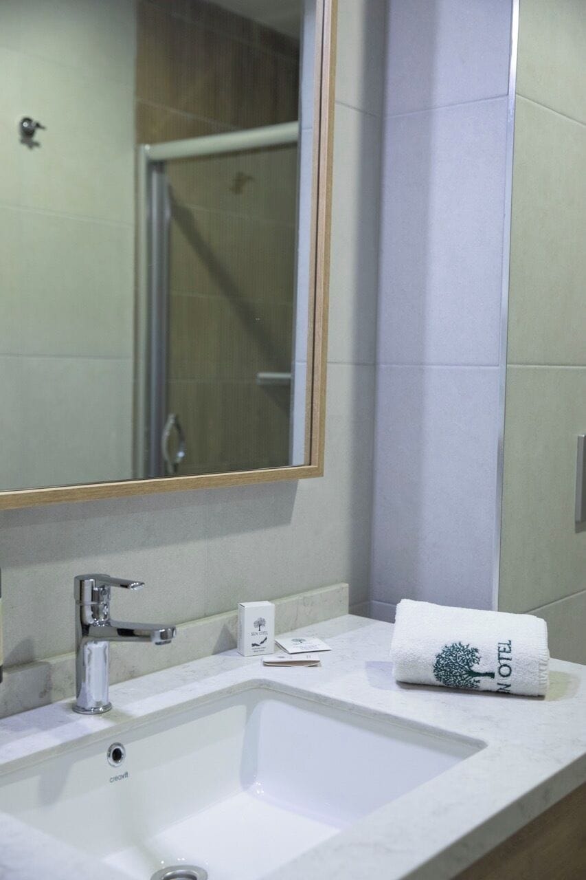 Shower, free toiletries, hair dryer, slippers