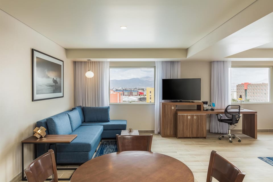 Premium King Room with Sofa Bed and Bath | Premium bedding, down comforters, pillowtop beds, in-room safe