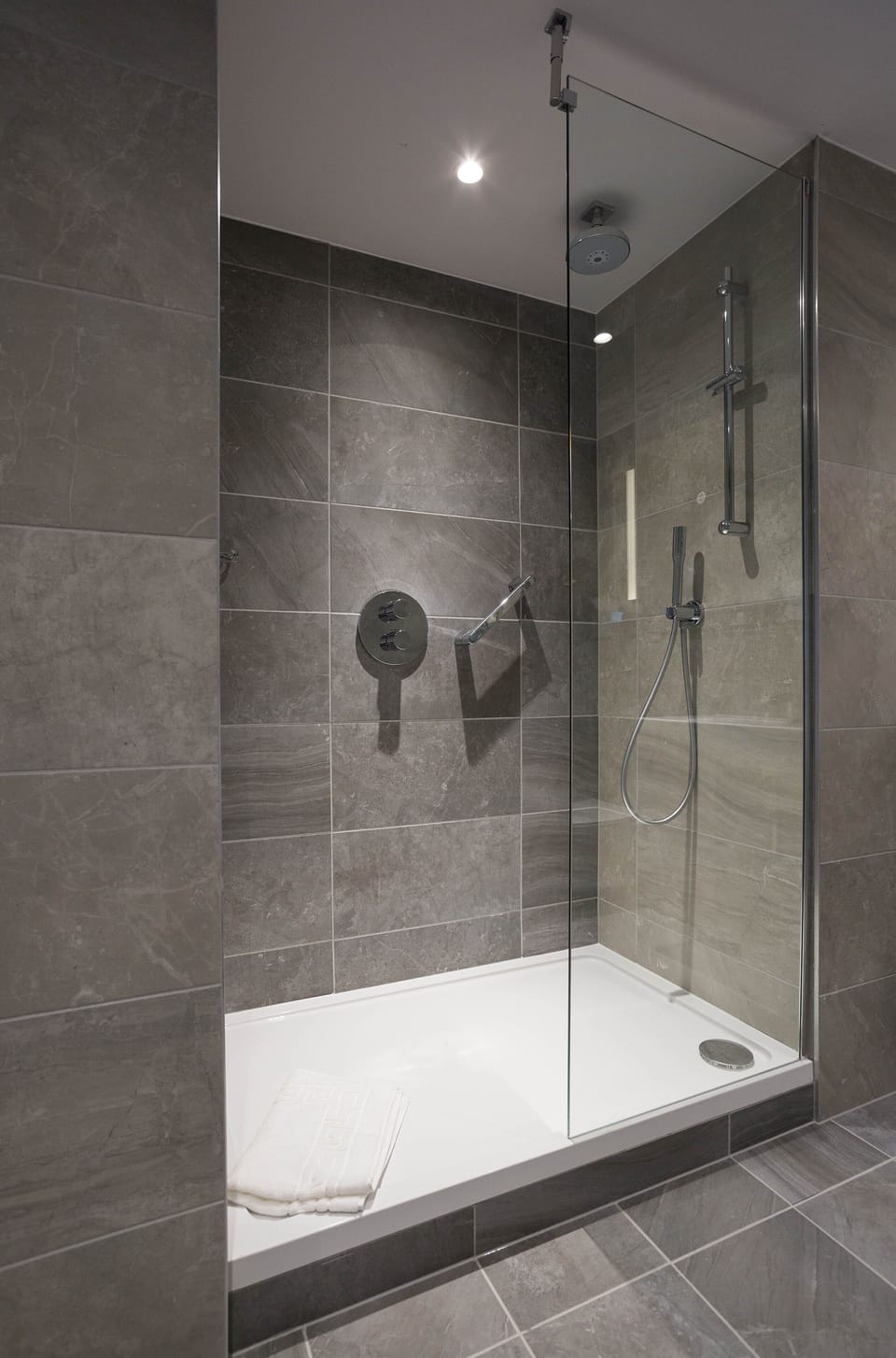 Shower, eco-friendly toiletries, hair dryer, towels
