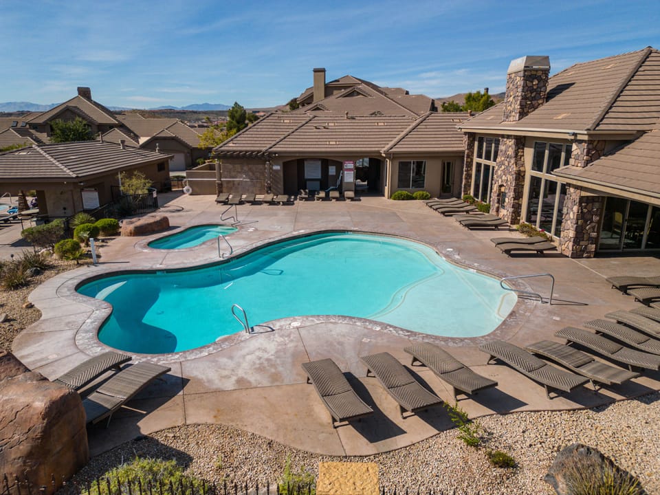 Upper pool with small putting green. Pools are heated year round.