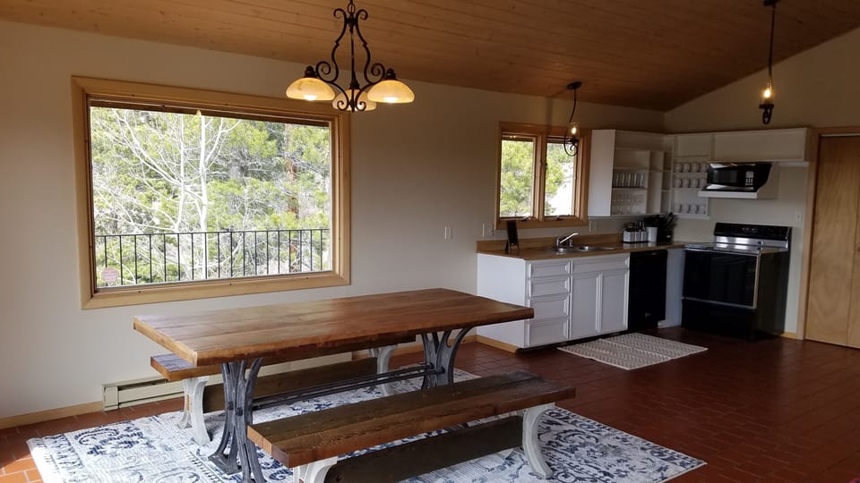 Furnished kitchen with all the main essentials. Washer/dryer also on this floor.