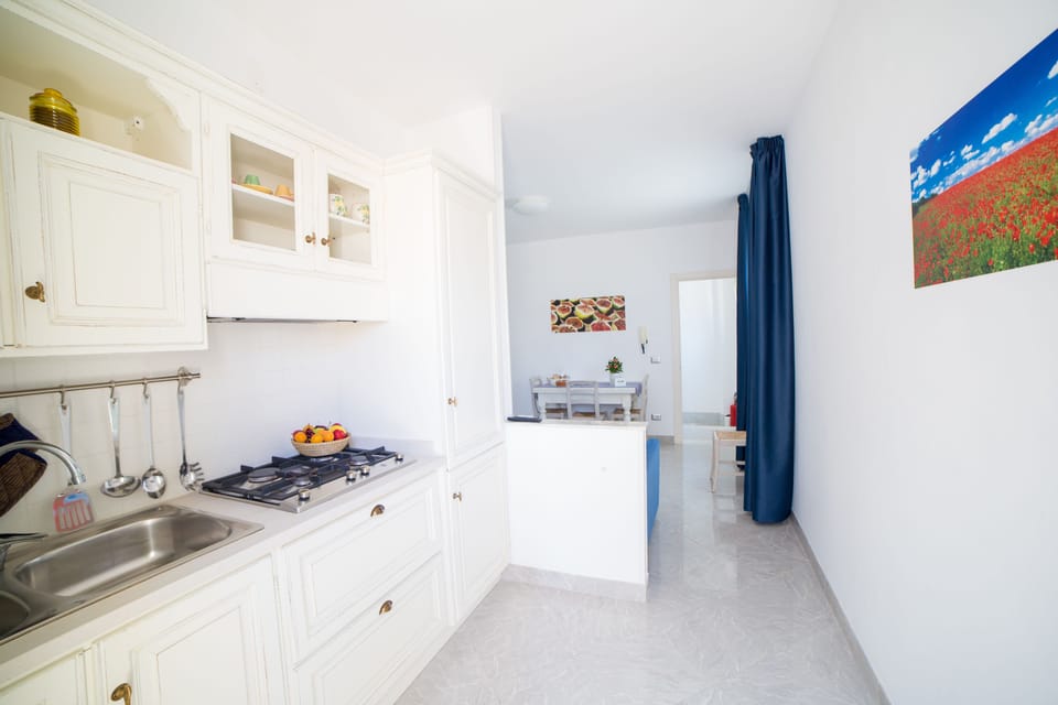 Apartment, 1 Bedroom (4 PAX) | Private kitchen | Fridge, stovetop, coffee/tea maker, electric kettle