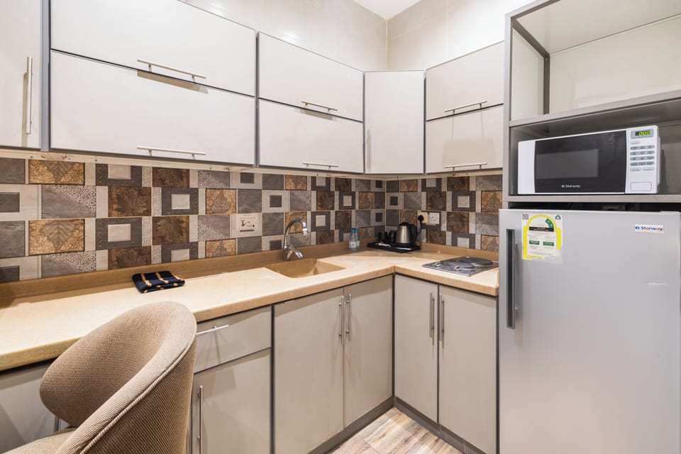 Apartment, 1 Bedroom, Kitchen | Private kitchen | Fridge, electric kettle