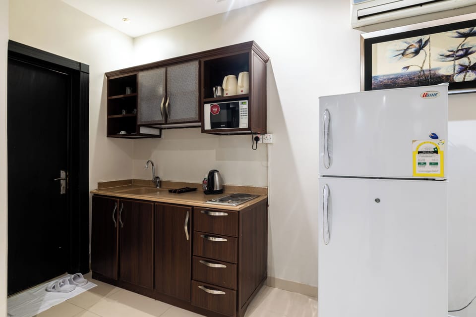 Apartment, 1 Bedroom, Kitchen | Private kitchen | Fridge, electric kettle, cleaning supplies