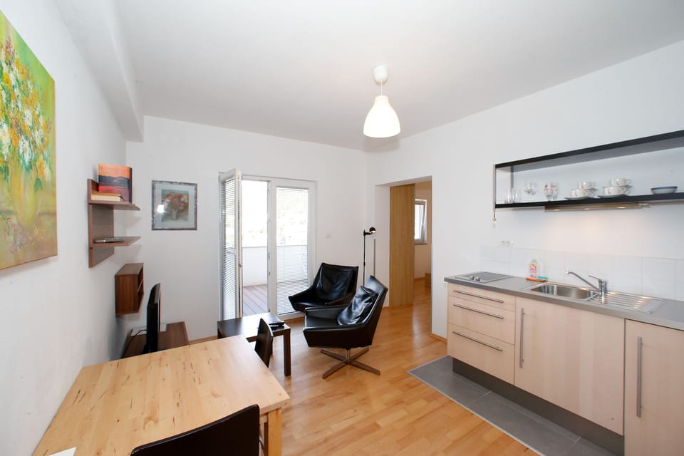 Comfort Studio, Sea View | Living area | Flat-screen TV, pay movies