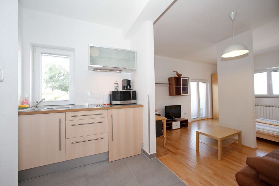 Comfort Studio, Sea View | Private kitchen | Full-size fridge, stovetop, coffee/tea maker, cookware/dishes/utensils