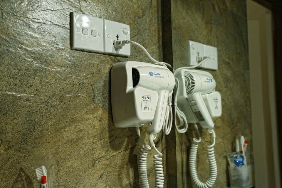 Shower, designer toiletries, hair dryer, bidet