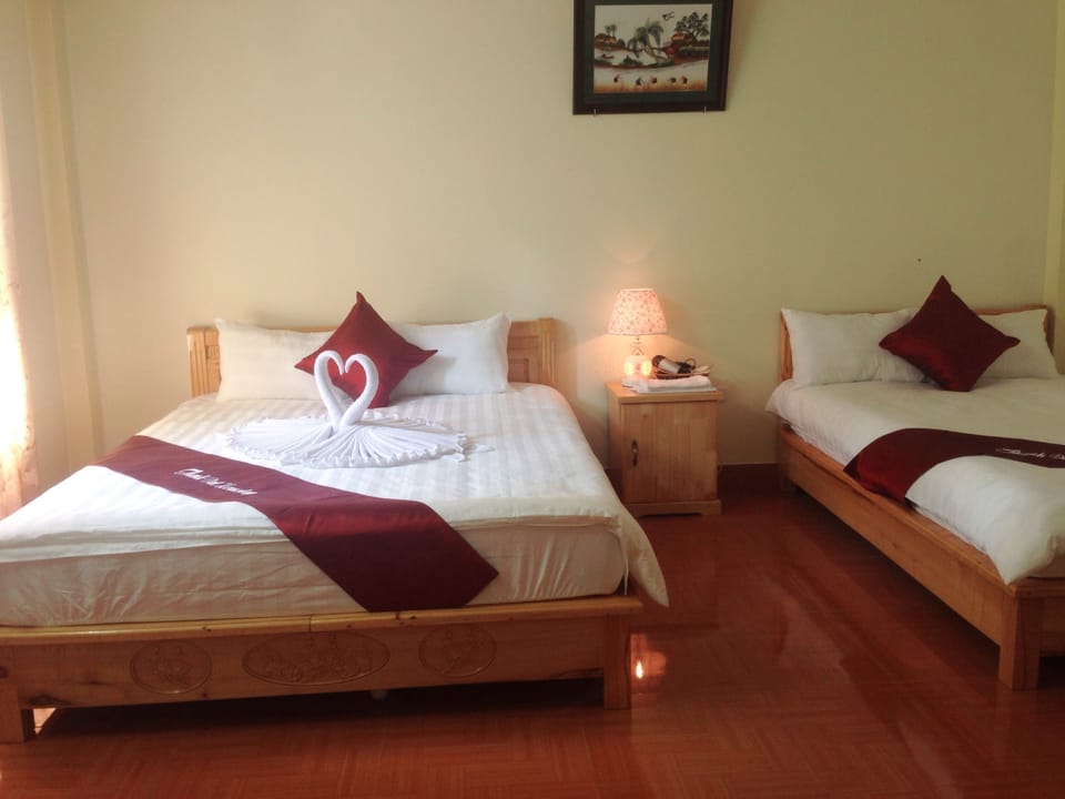 Deluxe Triple Room, Multiple Beds, Private Bathroom, Garden Area | Minibar, desk, blackout drapes, soundproofing