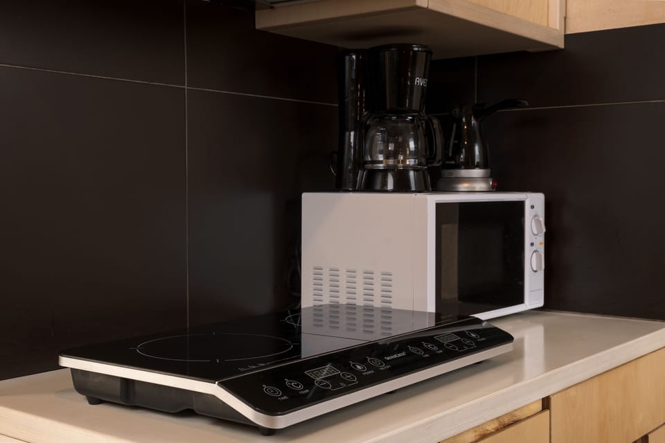 City Studio, Terrace (First Floor) | Private kitchen | Full-size fridge, microwave, stovetop, coffee/tea maker
