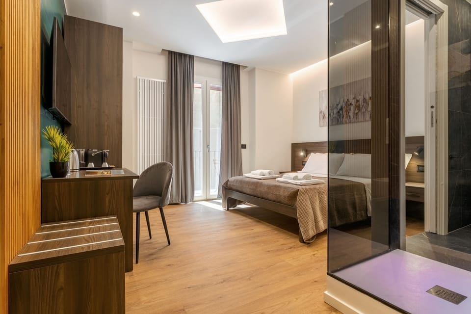 Deluxe Room | Premium bedding, minibar, desk, soundproofing